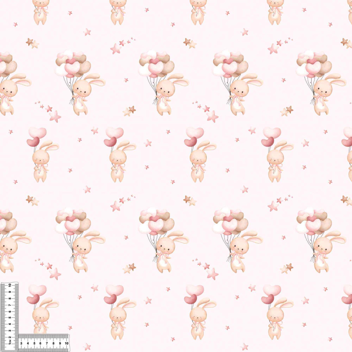 Detailaufnahme vom Verspielter Jersey Stoff mit Hasen und Sternen Details auf hellem Hintergrund, perfekt für kreative Nähprojekte