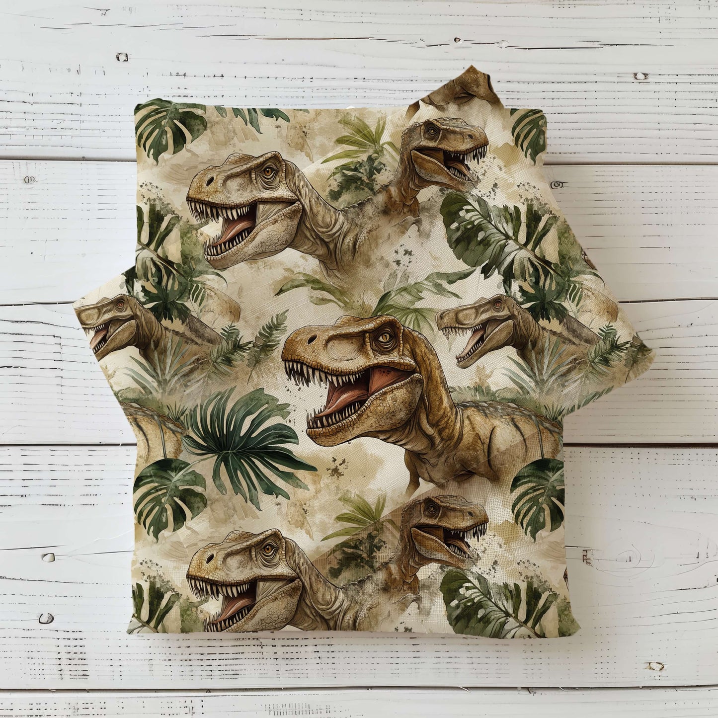 Realistischer Dino Stoff mit Tyrannosaurus und Dschungelblättern auf Jersey, Rib Jersey und French Terry – hochwertiger Kinderstoff als Meterware zum Nähen