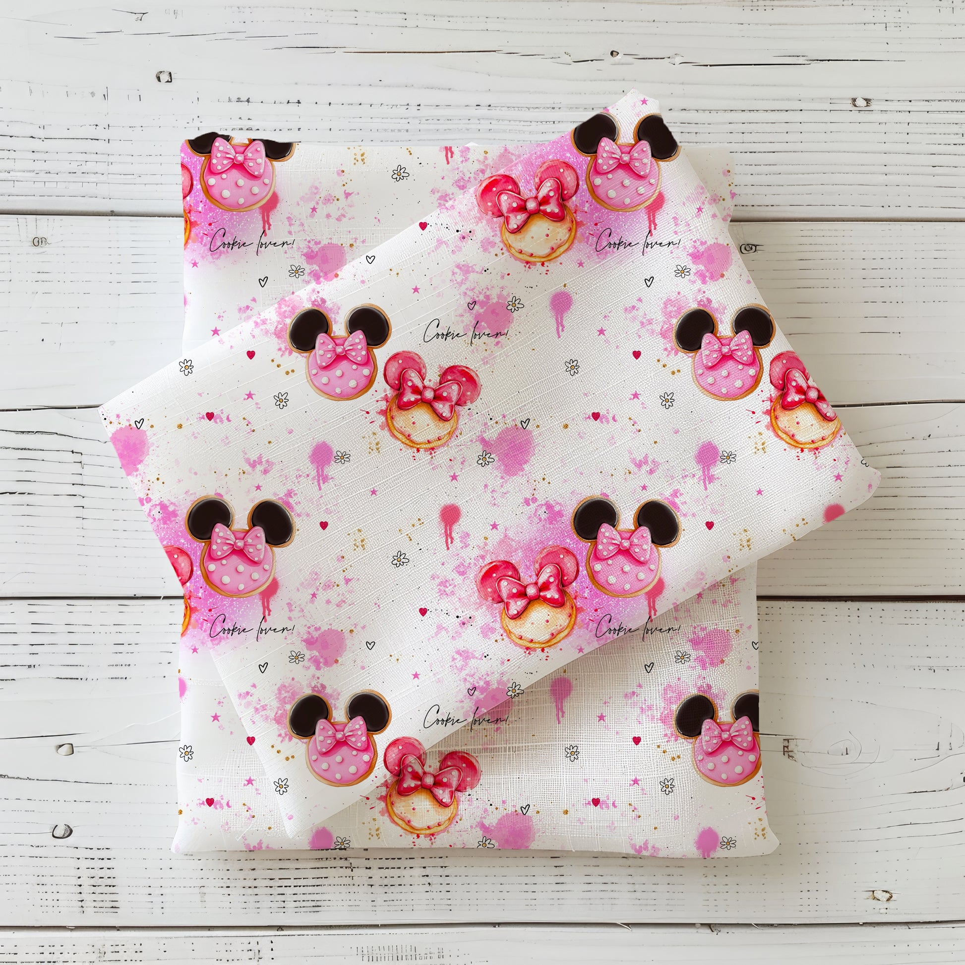 Cookie Lover Stoff – heller Stoff mit bunten Donuts, Schleifen und rosa Farbspritzern – erhältlich als Jersey, French Terry oder Rib Jersey Meterware