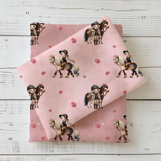 Mädchen & Pferd Stoff – rosa Stoff mit blondem Mädchen in Reiterkleidung & Pferd – erhältlich als Jersey, French Terry oder Rib Jersey Meterware